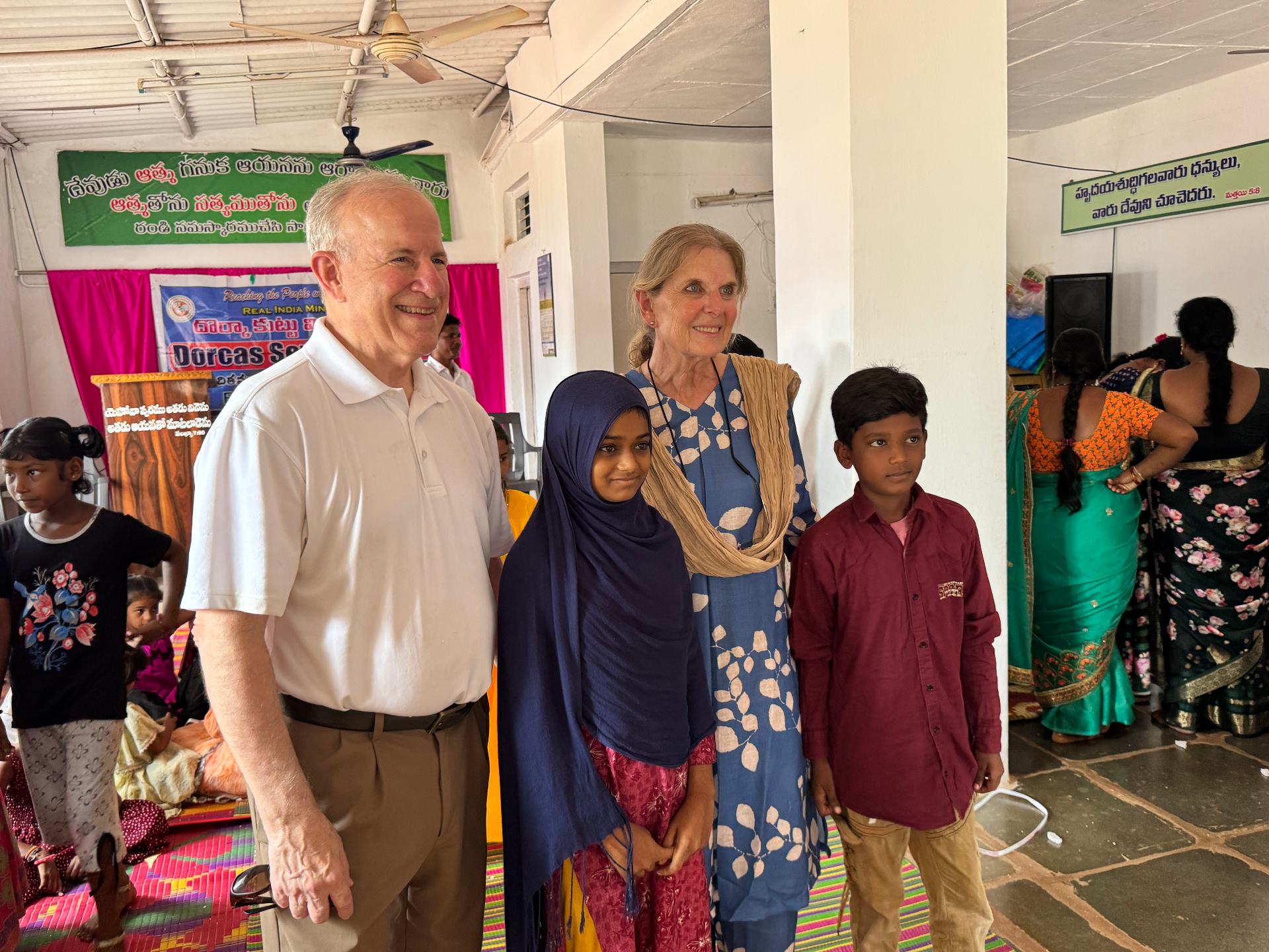 Bob and Barb with children at a church in India