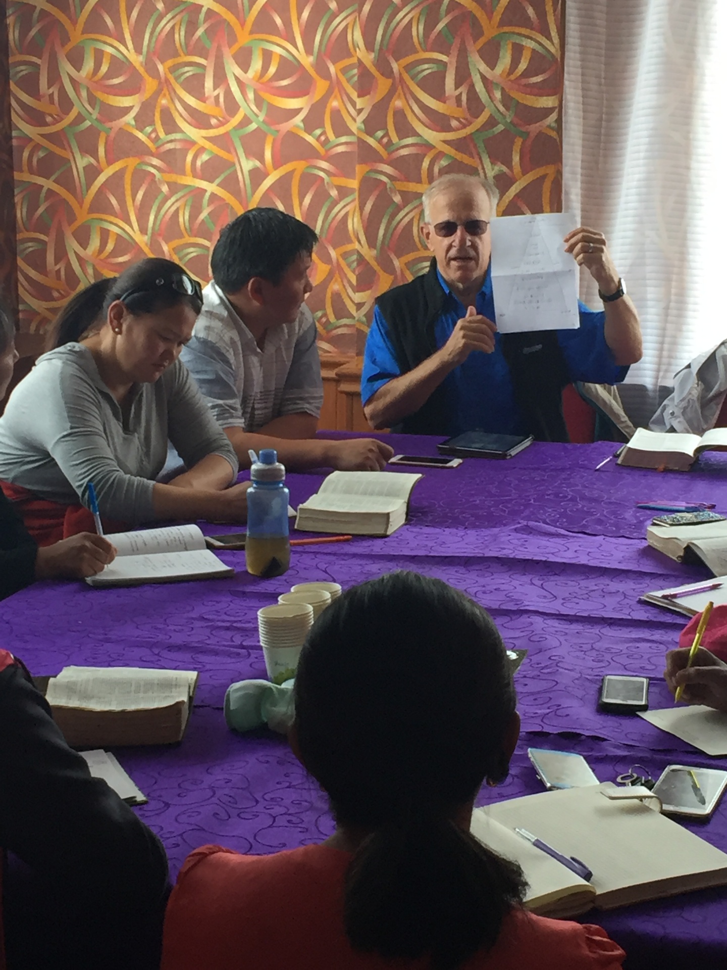 Pastor Bob leading a Bible study with Mongolian believers